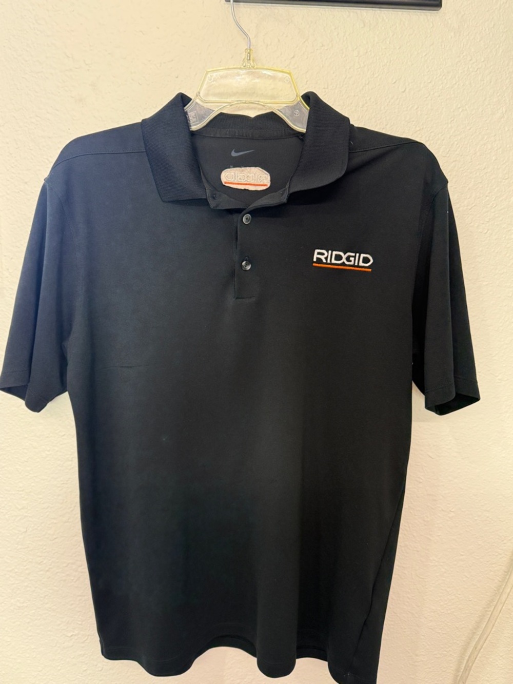 Nike Black Polo Shirt with Orange and White RIDGID Logo